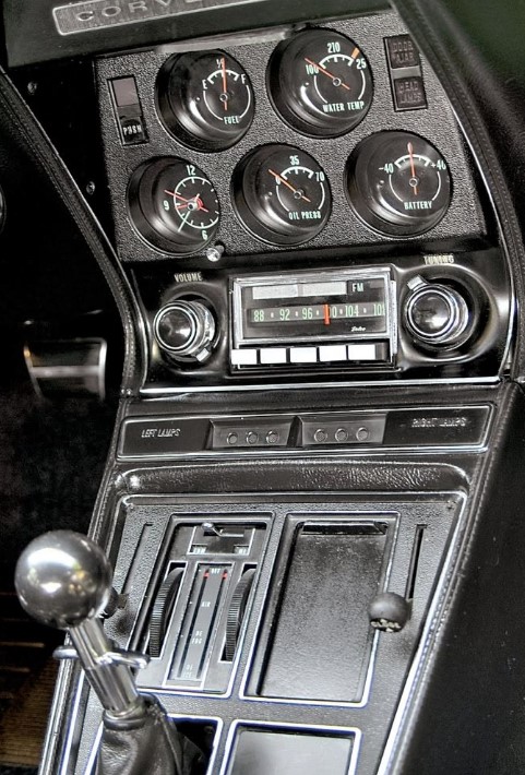 Corvette gauge cluster and factory radio